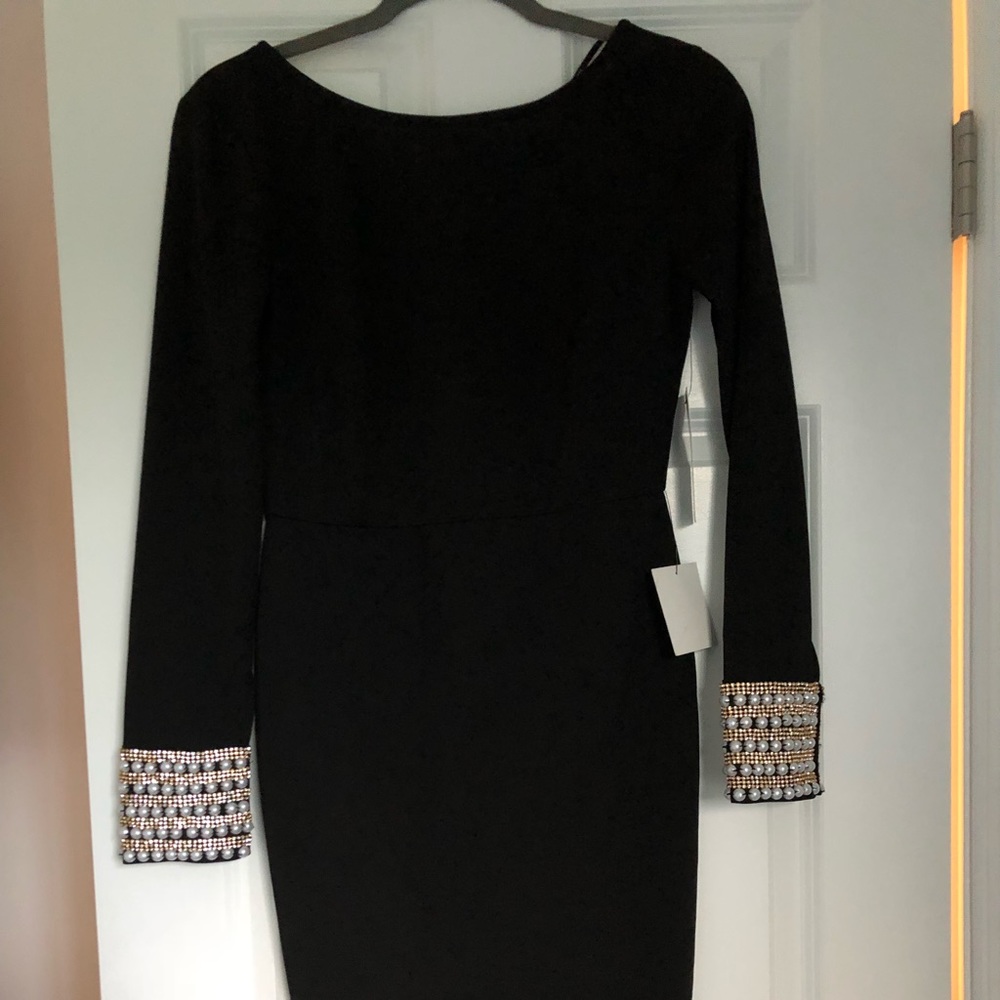 Stunning Little black dress w/sleeve embellishment